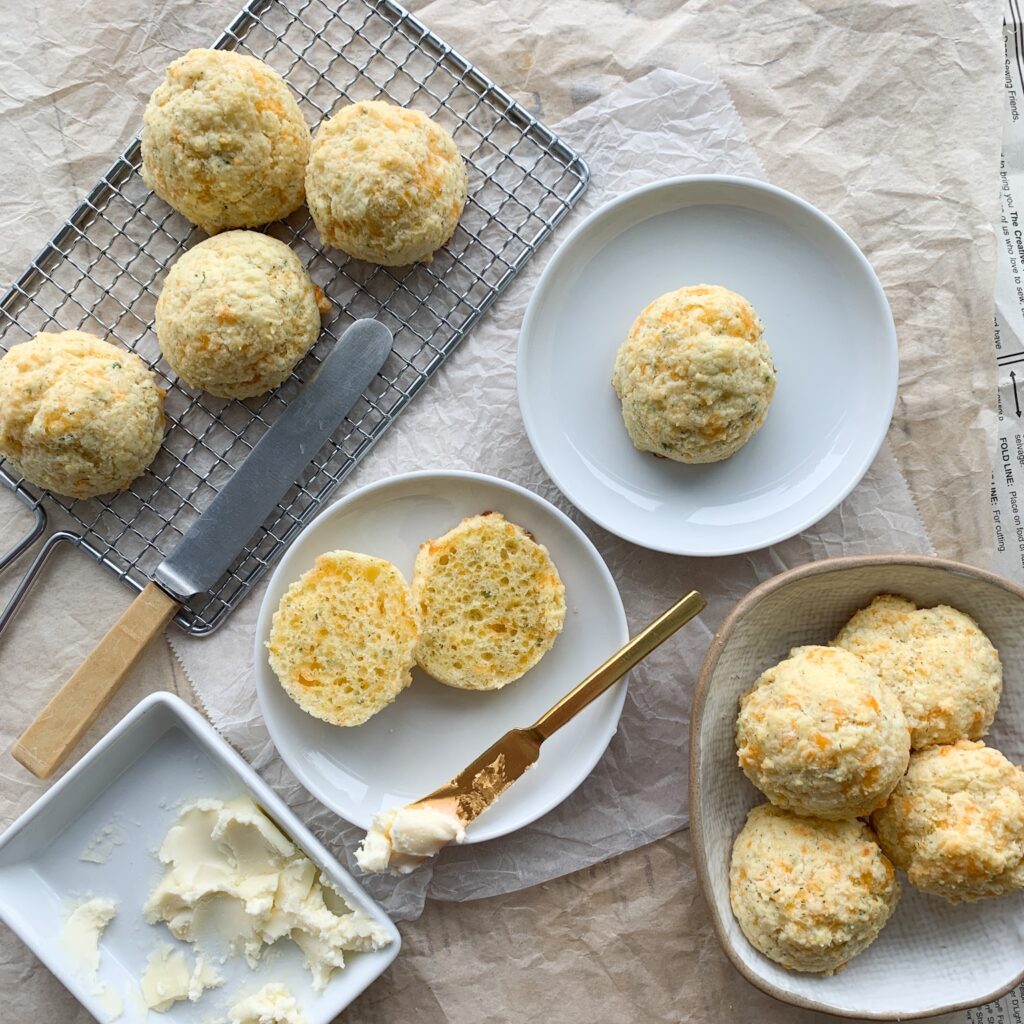Gluten-free cheese biscuits that are easy to make, taste delicious, only needs 7 ingredients to make and soft and cheesy inside. Perfect cozy comfort food for lunch or dinner with a bowl of soup or stew.