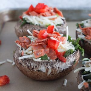 Cut down on prep time with an easy weeknight recipe for gluten-free portobello pizzas. Swap pizza dough with large mushroom caps and you will have a quick and easy, healthy, low carb and keto lunch or dinner for the family.