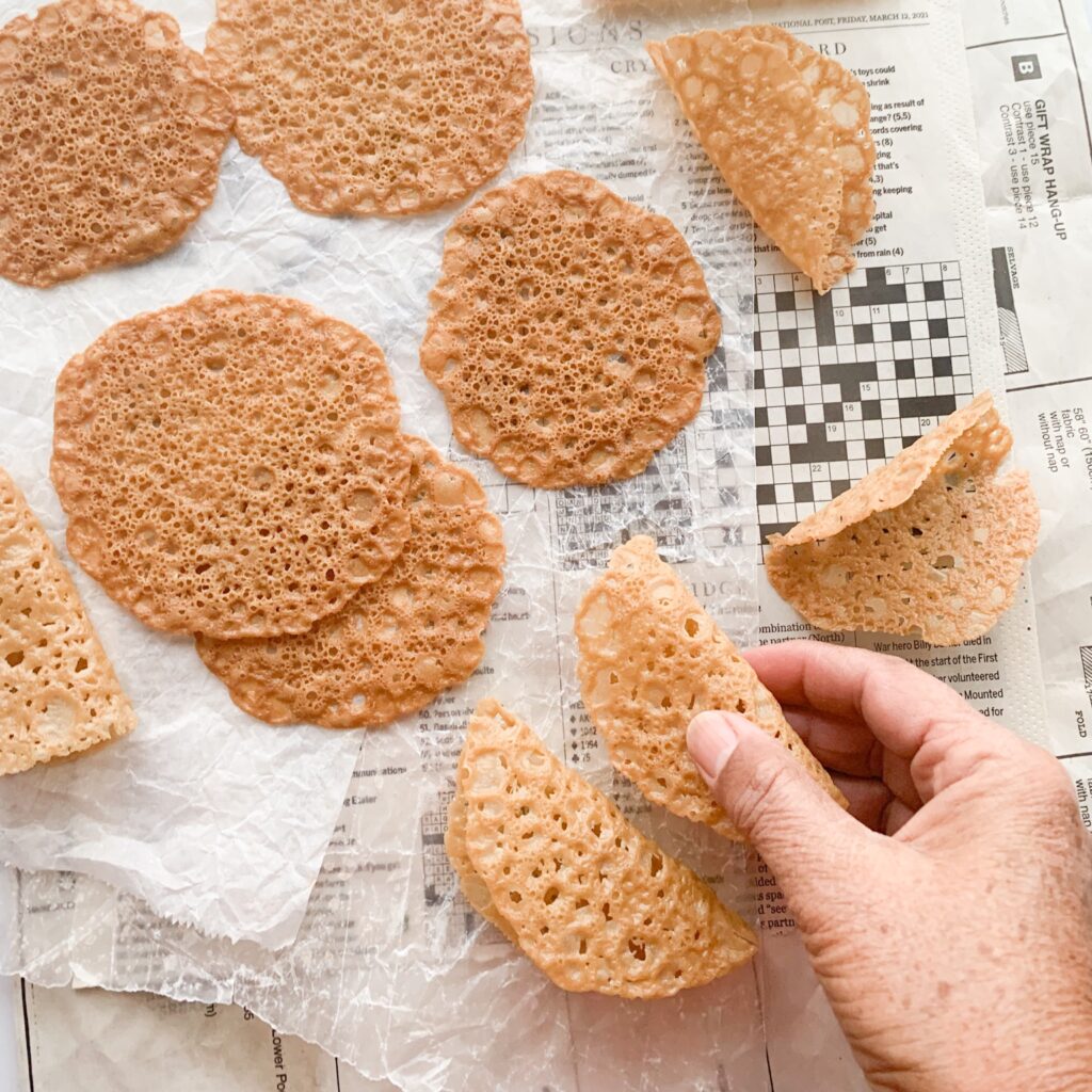 Gluten-free lace cookies are delicate, crispy cookies with a caramel flavour and have the look of lace. Also called florentine and tuilles cookies they are surprisingly simple to make and only uses 5 ingredients.
