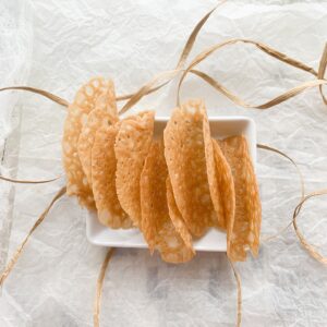 Gluten-free lace cookies are delicate, crispy cookies with a caramel flavour and have the look of lace. Also called florentine and tuilles cookies they are surprisingly simple to make and only uses 5 ingredients.