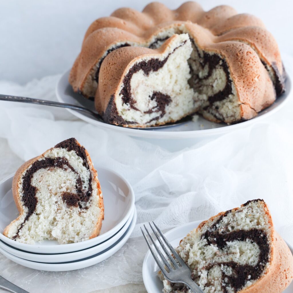 Gluten-free marble bundt cake is a swirled mixture of chocolate and vanilla. The cake is moist and full of chocolate and vanilla flavours in every bite. Top with my dairy-free chocolate coconut sauce and it is perfect for celebrations and holiday desserts.