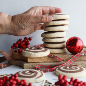 Gluten and dairy-free pinwheel cookies that are perfect for the holidays. Vanilla and chocolate all swirled together.