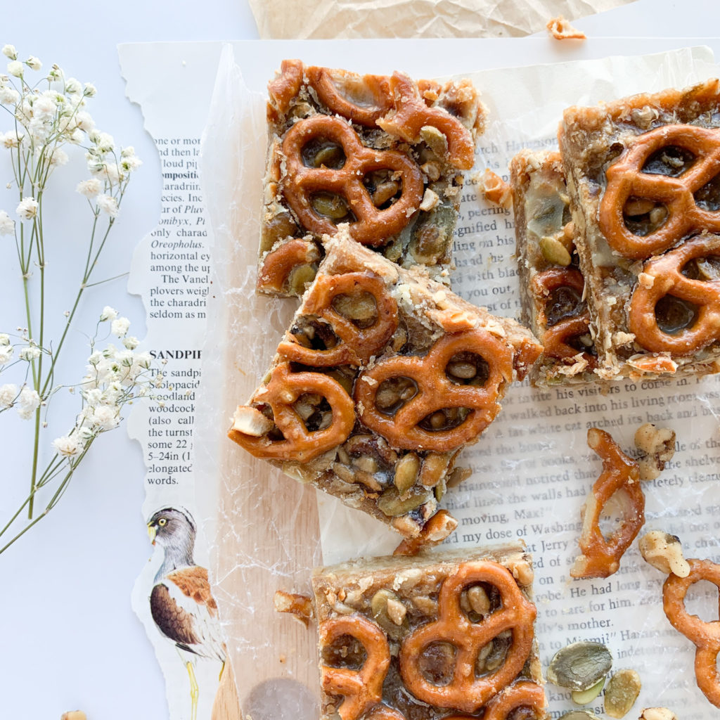 Gluten-free pretzel nut squares that have a shortbread crust and a gooey filling with salty pretzels on top.