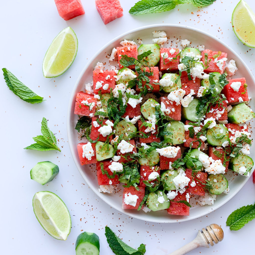 This fresh watermelon, cool cucumber, tangy feta, fresh mint and a drizzle of lime and honey is the perfect summer salad.