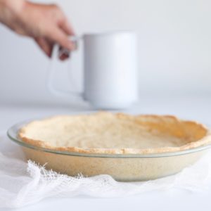 This low carb, gluten-free and keto pie crust is so easy to make. Less then 10 minute prep and only 5 ingredients to make this no chill or roll keto pie crust.