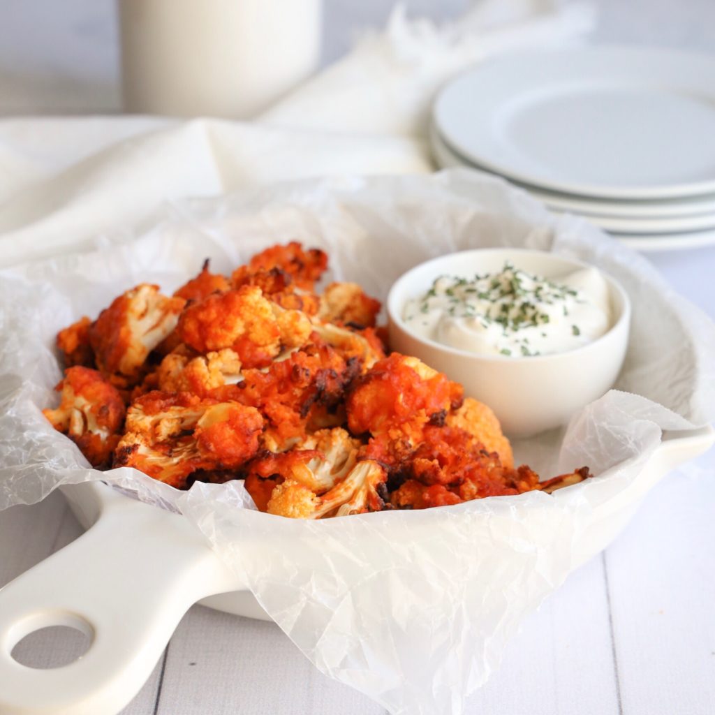 This gluten-free air-fried spicy cauliflower wing recipe will be loved my both meat and non-meat eaters.