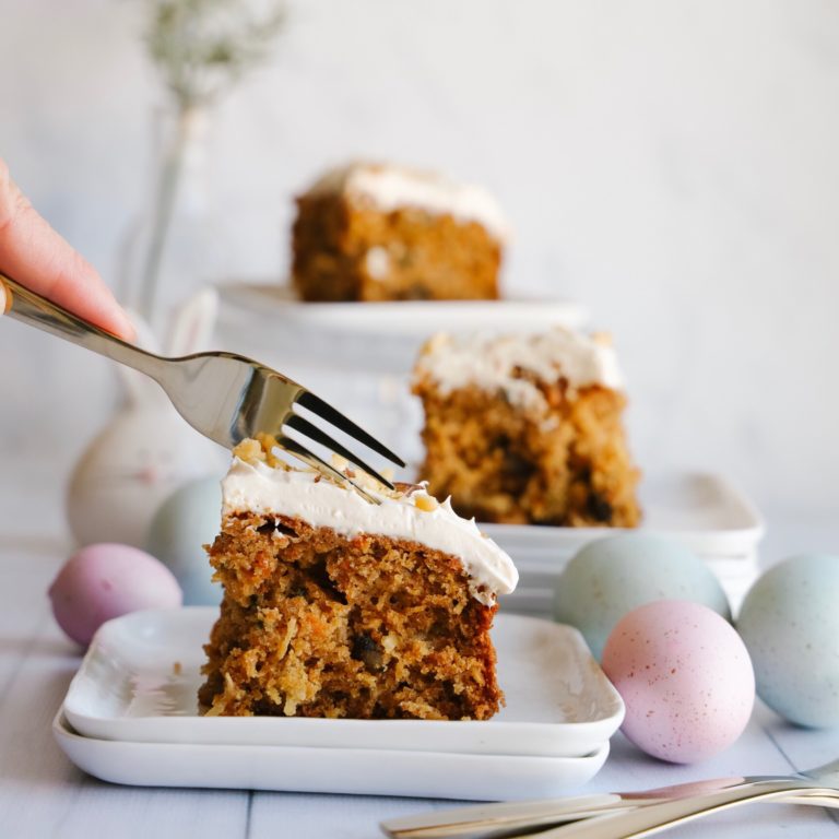 This delicious and easy to make gluten-free carrot cake is moist and fluffy and topped with a creamy cream cheese frosting. A no-fuss cake perfect for Easter and springtime.