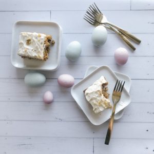 This delicious and easy to make gluten-free carrot cake is moist and fluffy and topped with a creamy cream cheese frosting. A no-fuss cake perfect for Easter and springtime.