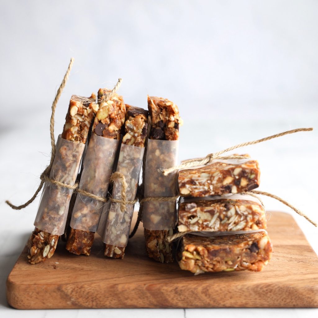 These vegan no-bake gluten-free raw granola bars are loaded with healthy ingredients like dates, pumpkin and flax seeds and almonds and walnuts.