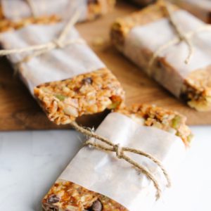 These vegan no-bake gluten-free raw granola bars are loaded with healthy ingredients like dates, pumpkin and flax seeds and almonds and walnuts.