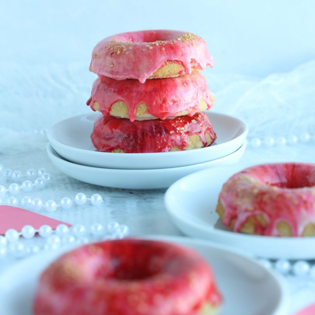 There are a few things better than a glazed donut. My recipe for gluten-free galaxy donut glaze takes icing to another level. Swirls of icing sugar, milk and food colouring layered on top of a gluten-free baked donut.