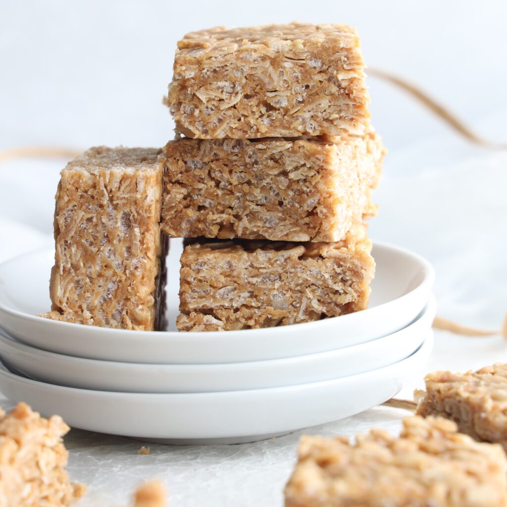 These gluten-free no-bake peanut butter crisp squares come together quickly and are a perfect grab and go breakfast, snack or after school treat. Made with 6 pantry ingredients.