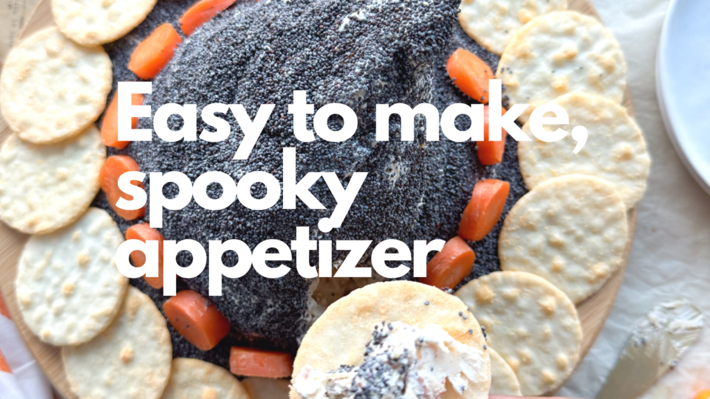 This homemade cheeseball is shaped into a witch hat and covered in poppyseeds or black sesame seeds. It is easy to make, ghoulishy delicious, kid friendly, fun to make and the perfect gluten-free appetizer for your Halloween party or scary movie night.