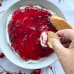 Cranberry goat cheese dip is an easy to make, no-bake, delicious, 3 ingredient gluten-free holiday appetizer. Use canned or homemade cranberry sauce for the topping in the recipe. Creamy, tangy, sweet and oh so good!
